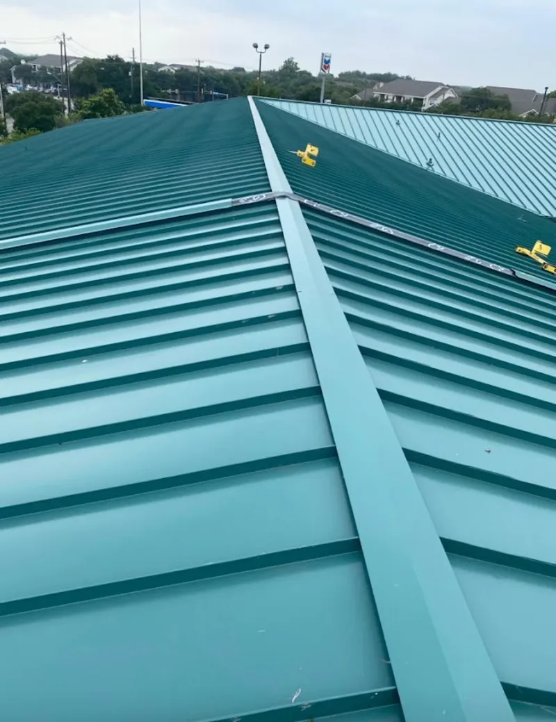 Green commercial metal roof ridge and valley for Metal Roof Repair in Grosse Pointe Farms
