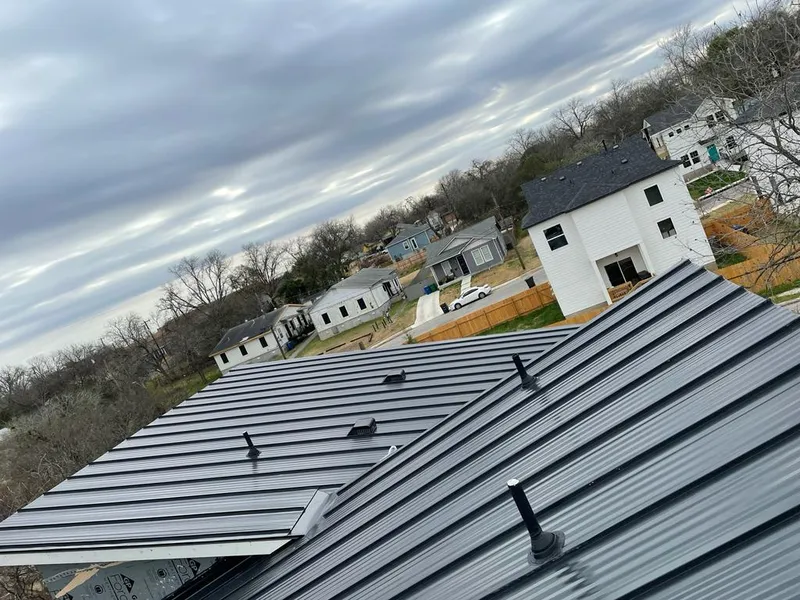 Standing seam metal roof panels with vents for Skylight Repair in Grosse Pointe Farms